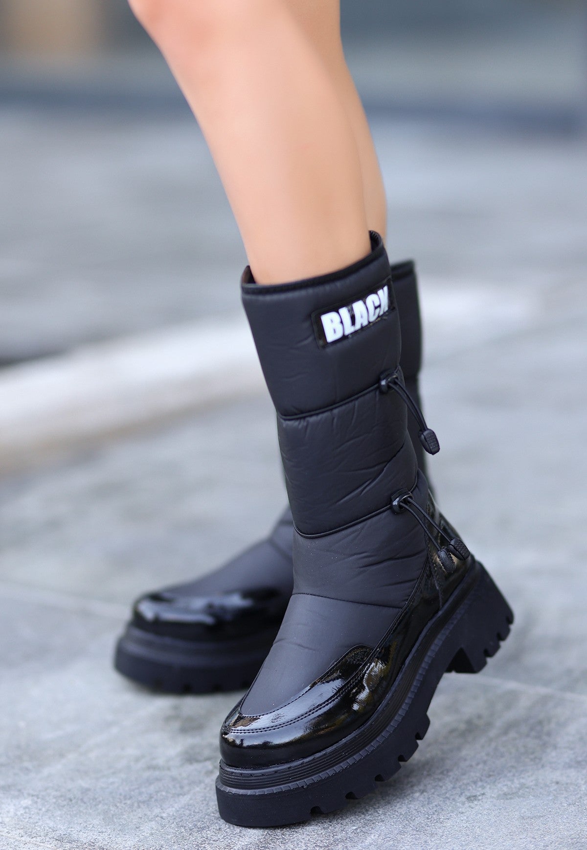 black patent leather snow boots