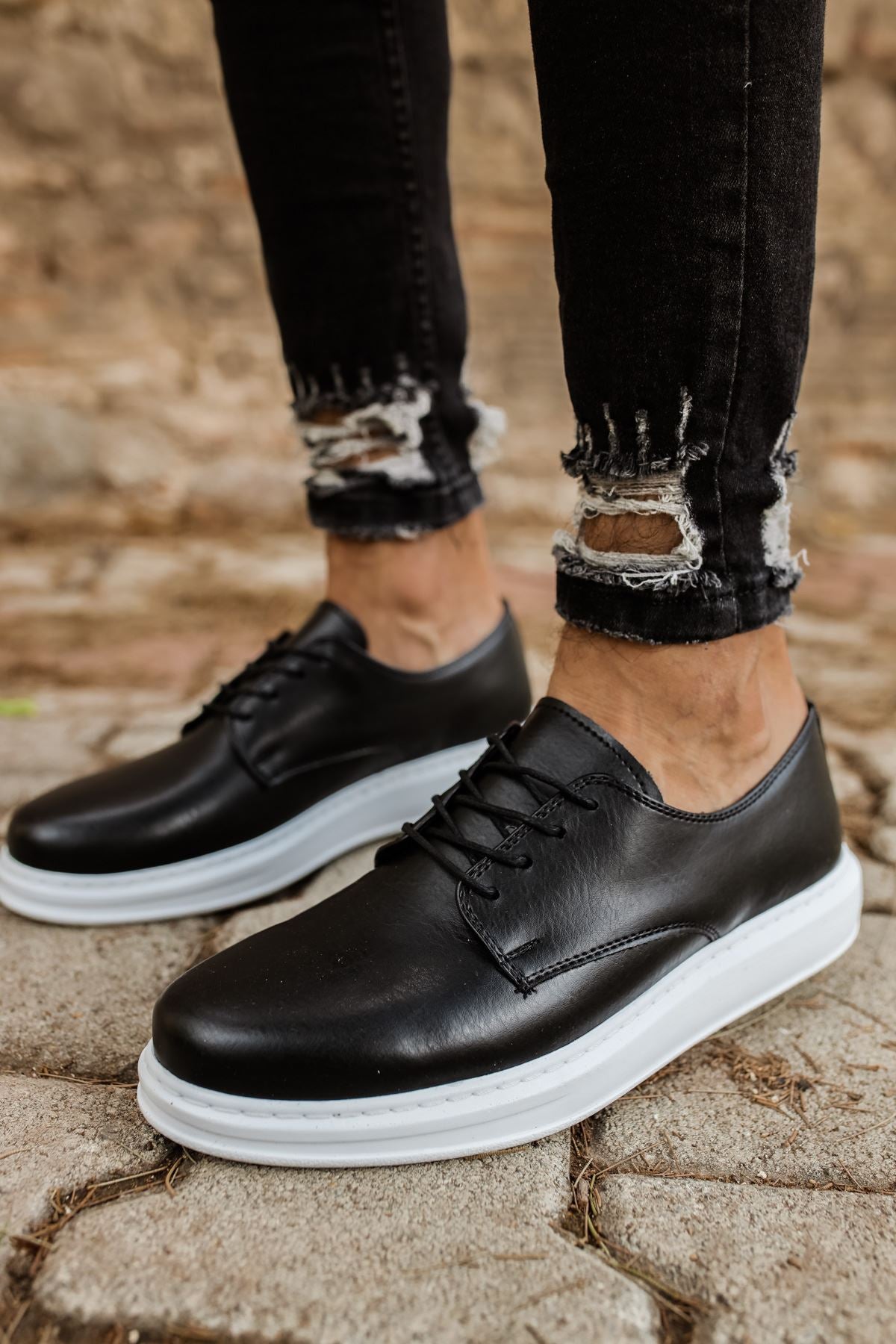 Black leather white sole sneakers on sale