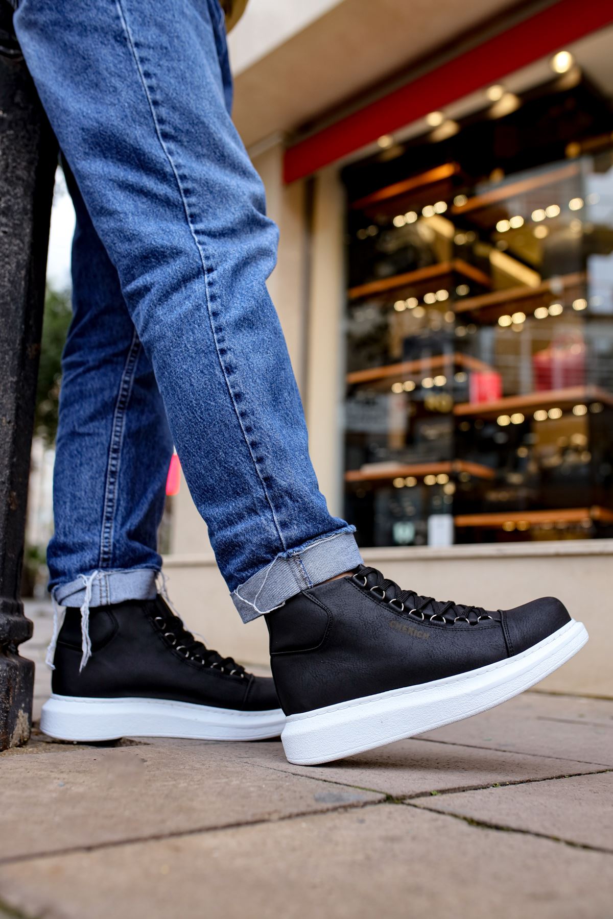 black and white sneaker boots