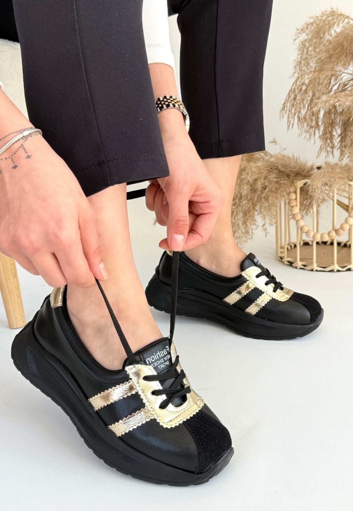 Women's Black Skin Gold Striped Sneakers